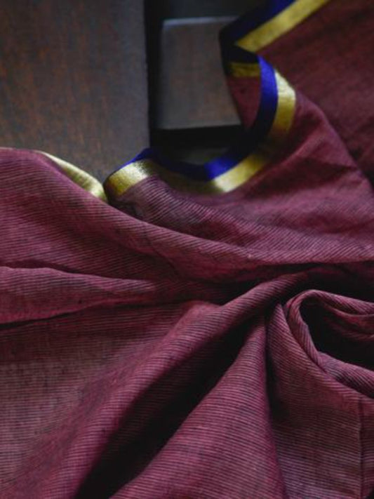 Brown mul with gold and blue border