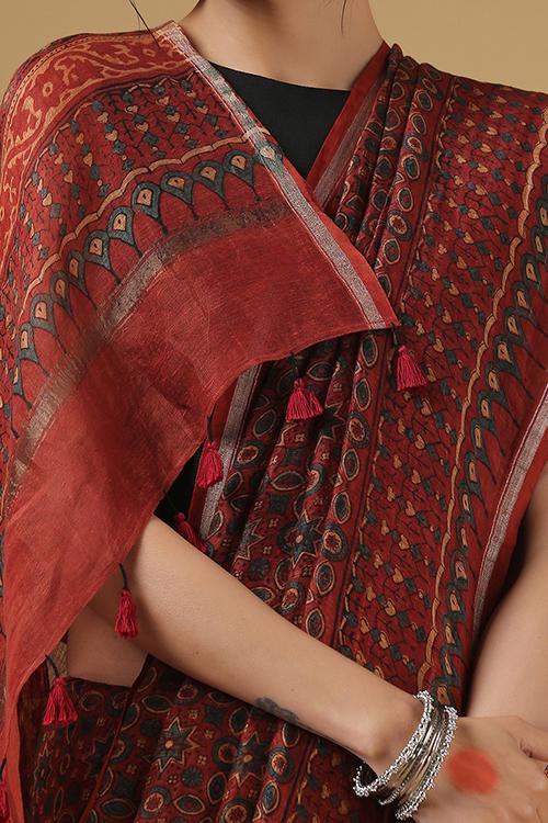 Handblock Printed Silk Linen Saree with Fita Flower Border.Col Rust.