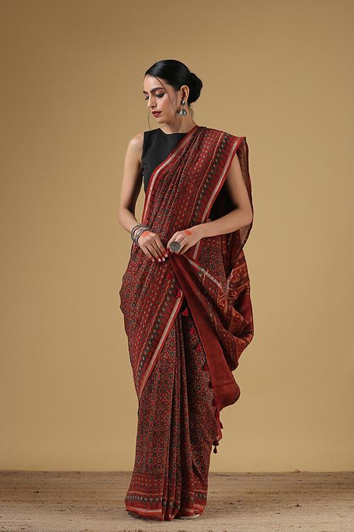 Handblock Printed Silk Linen Saree with Fita Flower Border.Col Rust.