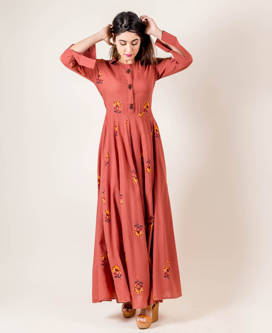 Anarkali Style Gown With Fancy Buttons In Rust Hue