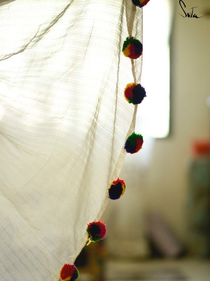 White with multicoloured pom pom